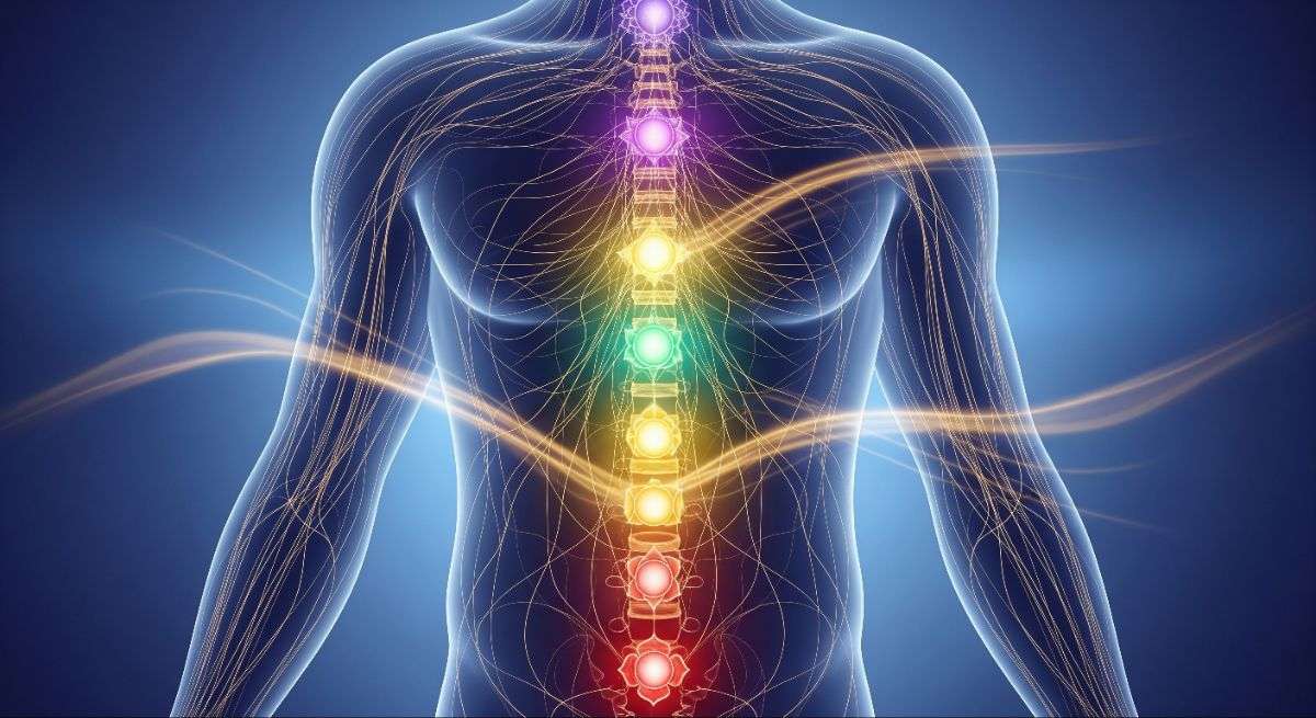 Illustration of prana energy flowing through nadis and chakras in the human body
