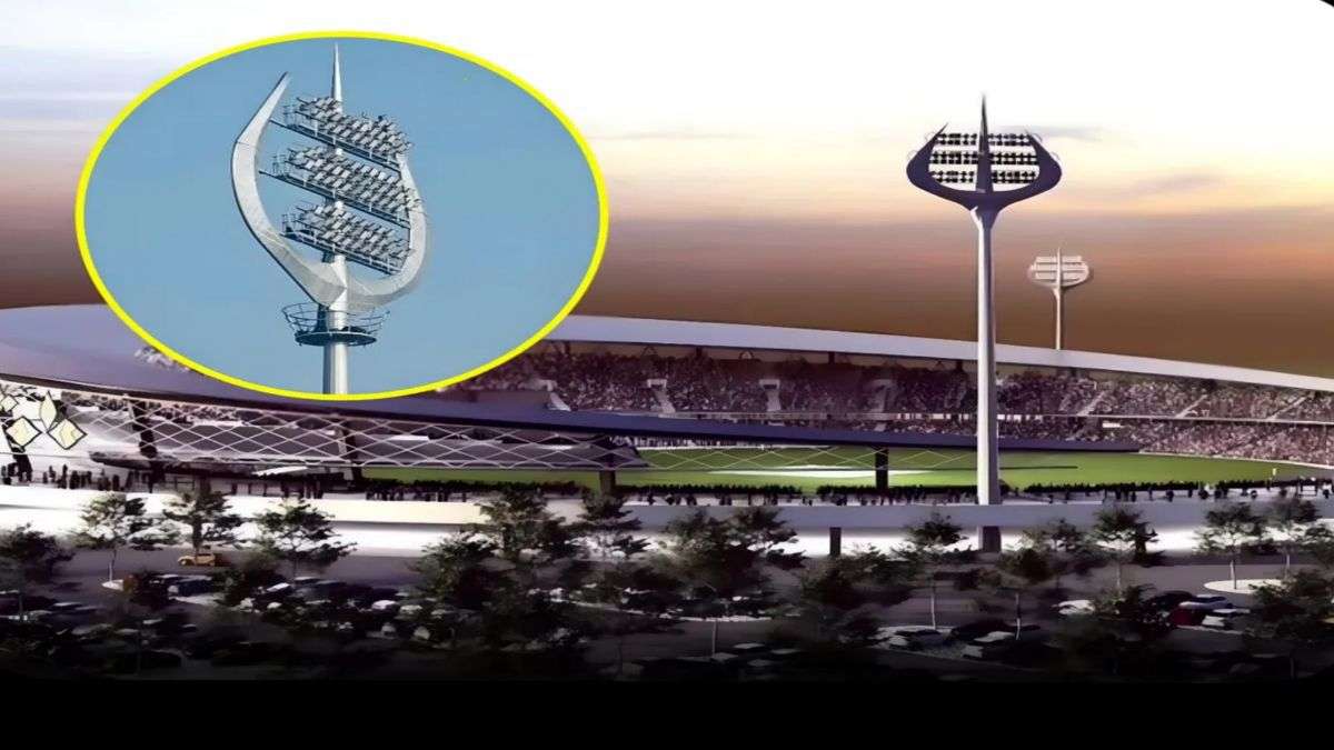 Trishul-shaped floodlights glowing at the new Kashi Cricket Stadium during sunset.