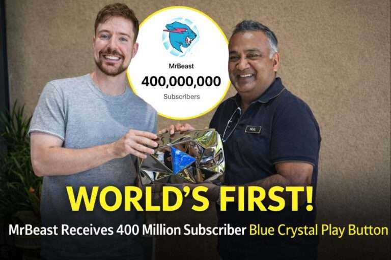 MrBeast holding the world's first 400 million subscriber Blue Crystal Play Button awarded by YouTube