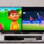 Split screen smart TV showing kids cartoon on one side and live cricket match on the other using multi view technology