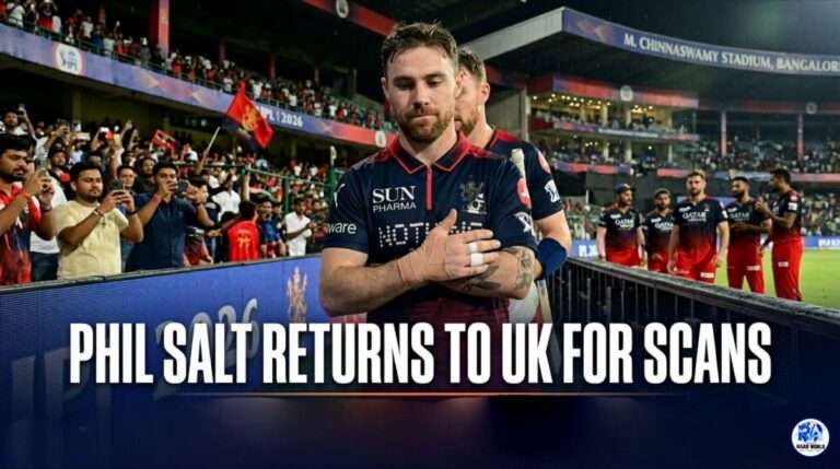 RCB opener Phil Salt walking off the field at night with a bandaged left hand and fingers, looking dejected. The stadium crowd, a giant screen displaying 'IPL 2026', and other players are in the background, with text overlay stating 'PHIL SALT RETURNS TO UK FOR SCANS' and a caption about his finger injury.