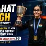 Anahat Singh celebrates after becoming the first Indian to win the 2026 World Junior Squash Championship, holding the championship trophy with the Indian flag following her historic victory over Ruqayya Salem.